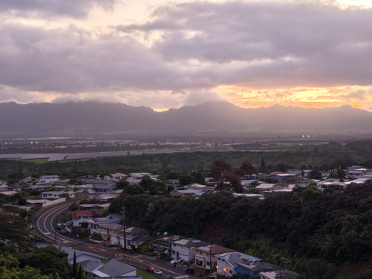 Golden hour aerial drone photo over an Oʻahu neighborhood